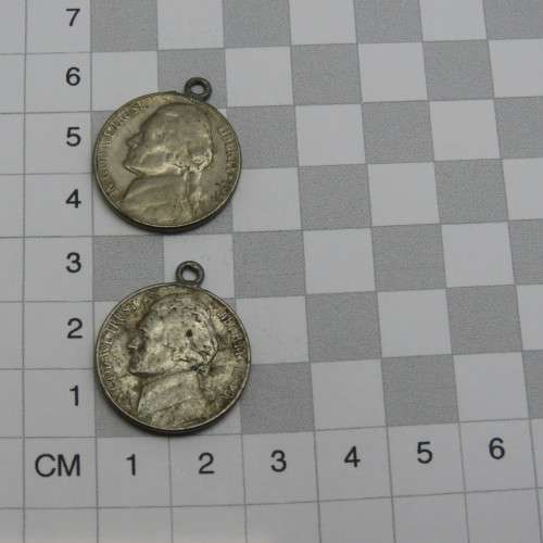 Lot of 8 coins made into pendants - Some silver in here