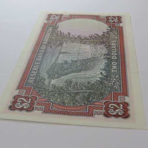 Reserve Bank of Rhodesia Two Dollars 24 May 1979 uncirculated with vertical dent centre