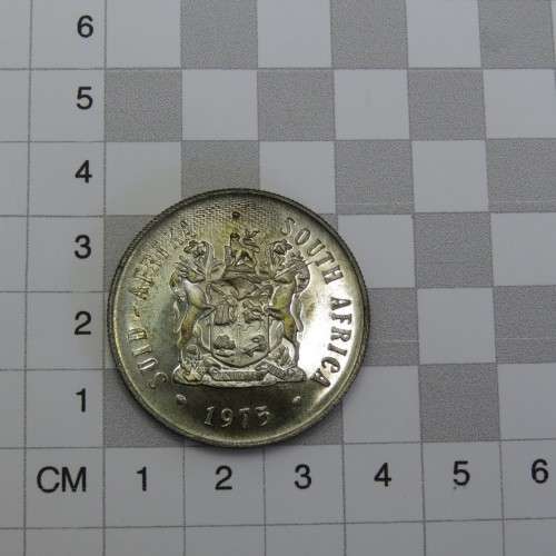 1975 South Africa silver proof one rand with die crack mark over body of Springbok