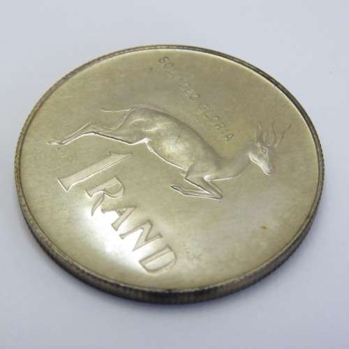 1975 South Africa silver proof one rand with die crack mark over body of Springbok
