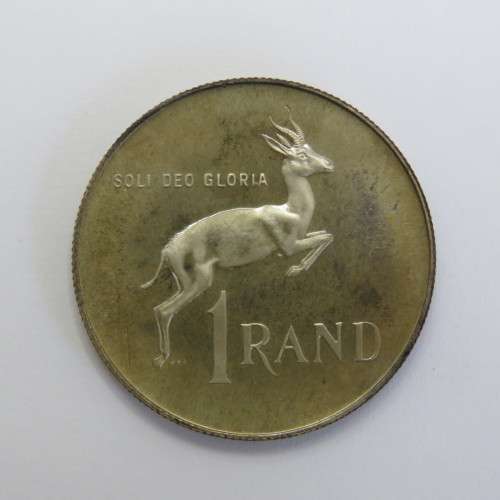 1975 South Africa silver proof one rand with die crack mark over body of Springbok