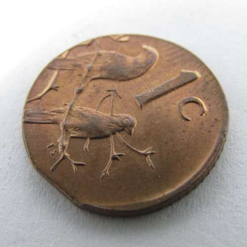 1975 South Africa cent struck on half cent planchet - weighs 2g