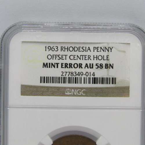 1963 Rhodesia Penny offset center hole mint error AU 58 BN graded by NGC