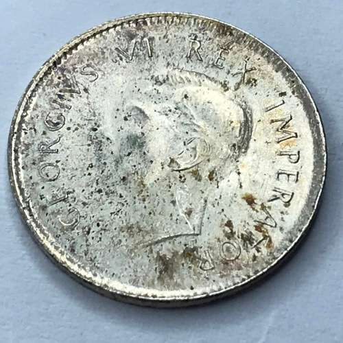 1942 SA Union Threepence 3d - UNC - Bad strike nose of George Brilliant!
