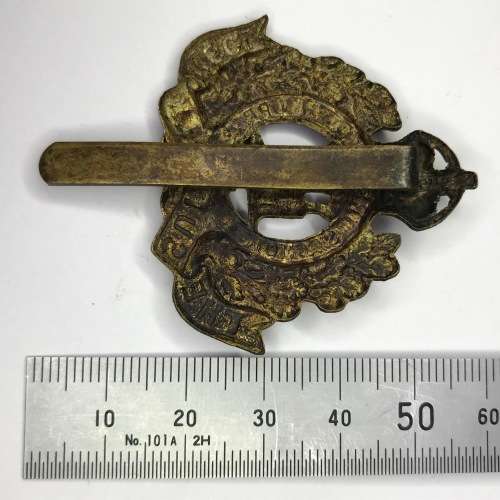 Great Britain Suffolk Regiment badge - 1915-1919 - Kings Crown - Brass - With slide