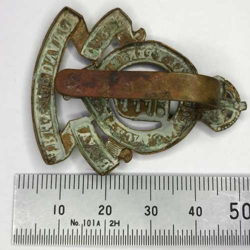 Great Britain Royal Army Ordnance corps 1919-1947 cap badge - Brass with slide