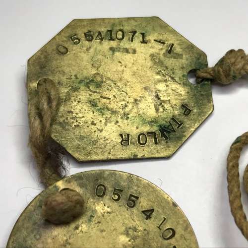 Set of 2 tags marked P Taylor 05541071 - 1