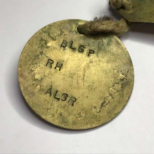 Set of 2 tags marked P Taylor 05541071 - 1