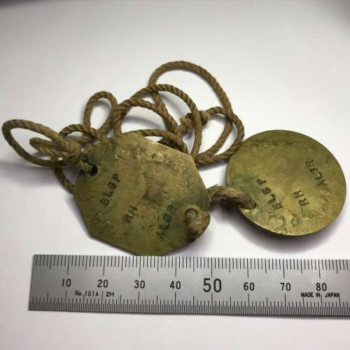 Set of 2 tags marked P Taylor 05541071 - 1