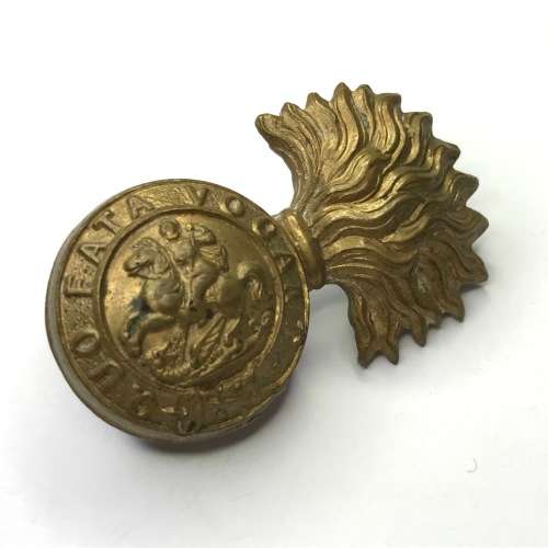 Great Britain Royal Northumberland Fusiliers collar badge, left side, lugs