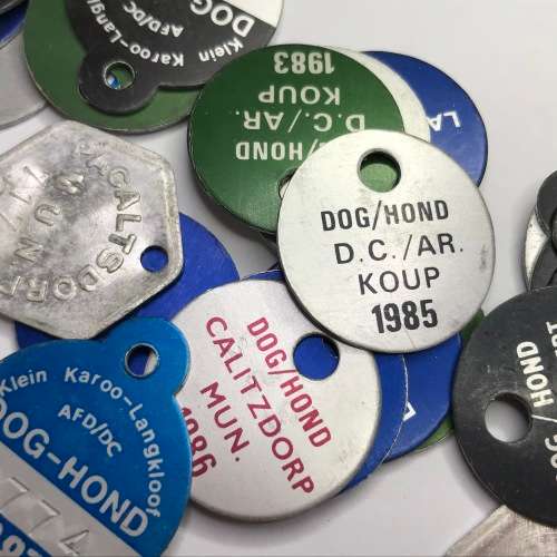 Lot of 50 dog licenses with RADAR numbers that read the same both ways