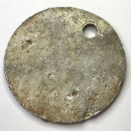 Aluminum Disc with 547 punched in