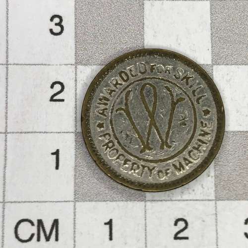 W.E. and S. Co. token - Awarded for skill - Good for one free game