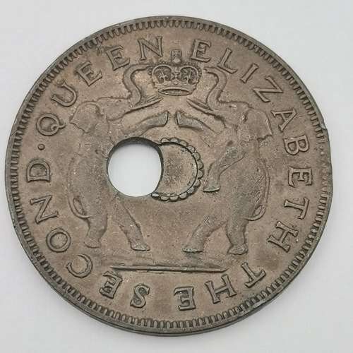 1957 One penny with totally misaligned center hole