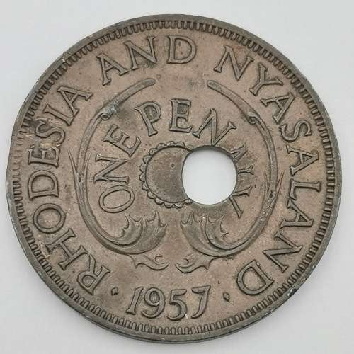 1957 One penny with totally misaligned center hole