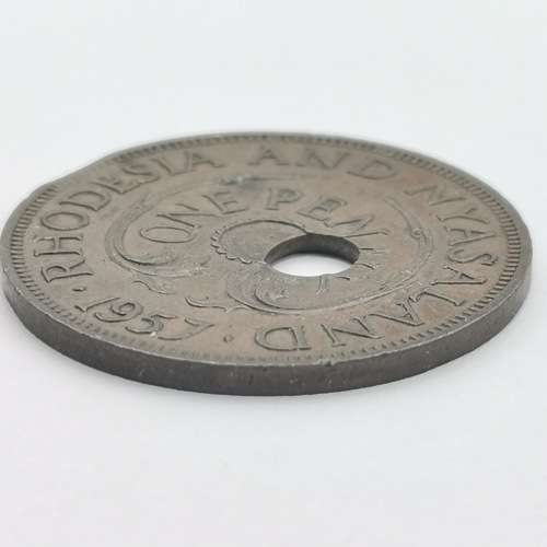 1957 One penny with totally misaligned center hole