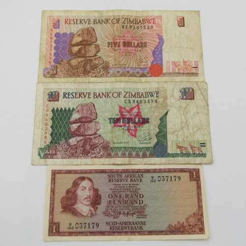 Lot of 8 International bank notes - some well used