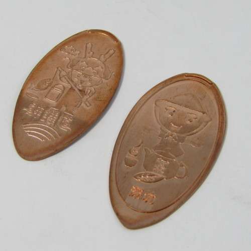 Lot of 9 elongated coins with comic / anime characters