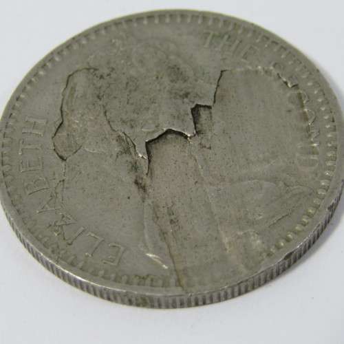 Rhodesia 1964 Error coin - major flaw obverse
