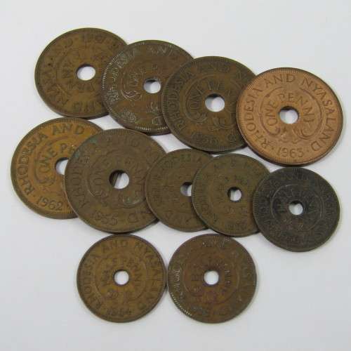 Lot of 11 different year Rhodesia & Nyasaland half pennies & pennies