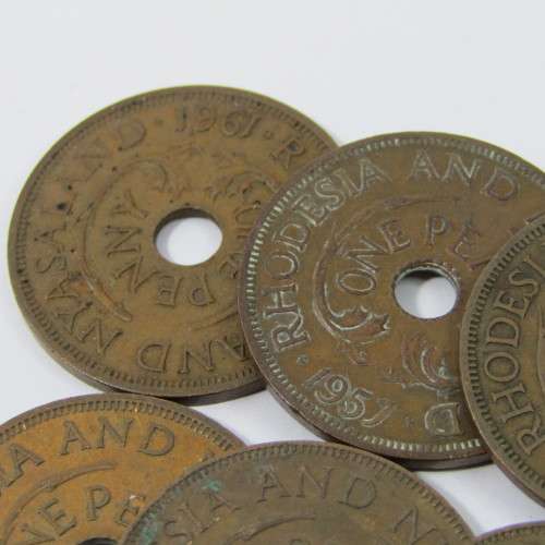 Lot of 11 different year Rhodesia & Nyasaland half pennies & pennies