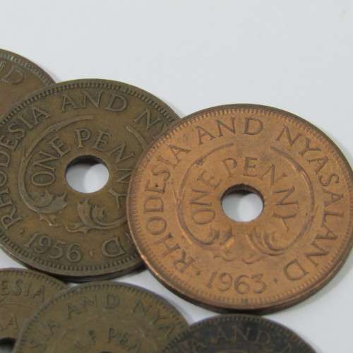 Lot of 11 different year Rhodesia & Nyasaland half pennies & pennies