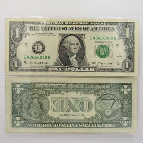 Pair of USA dollar bills with numbers that read the same in reverse