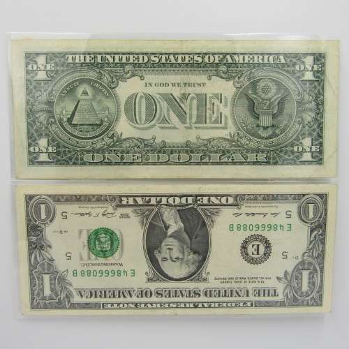 Pair of USA dollar bills with numbers that read the same in reverse