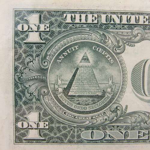 Pair of USA dollar bills with numbers that read the same in reverse