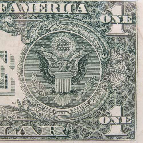 Pair of USA dollar bills with numbers that read the same in reverse