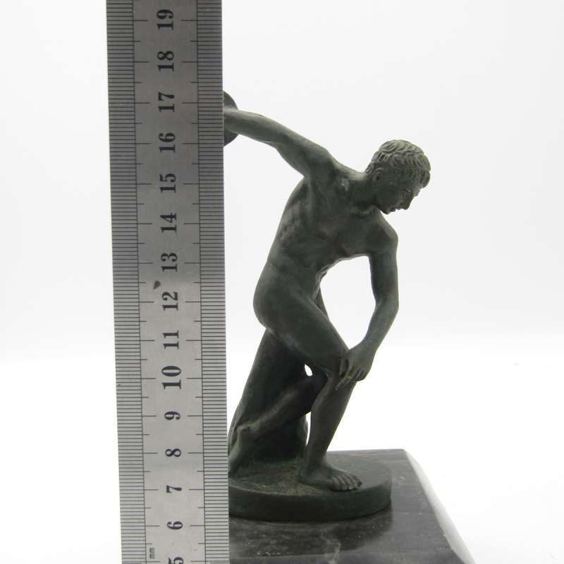 Vintage bronze discus thrower sculpture on stone base