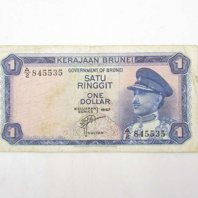Brunei 1967 One dollar banknote well used