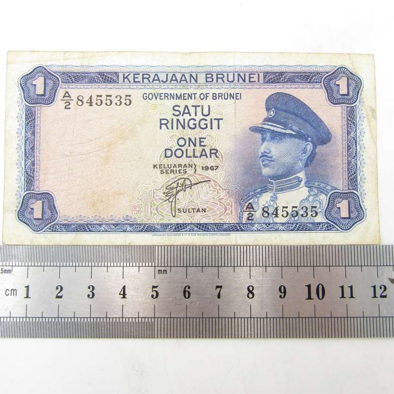 Brunei 1967 One dollar banknote well used