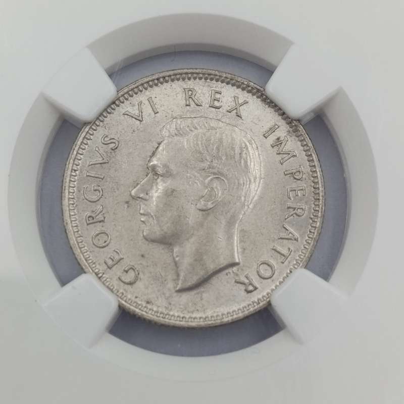 1943 SA Union silver 1 Shilling graded AU 58 by NGC