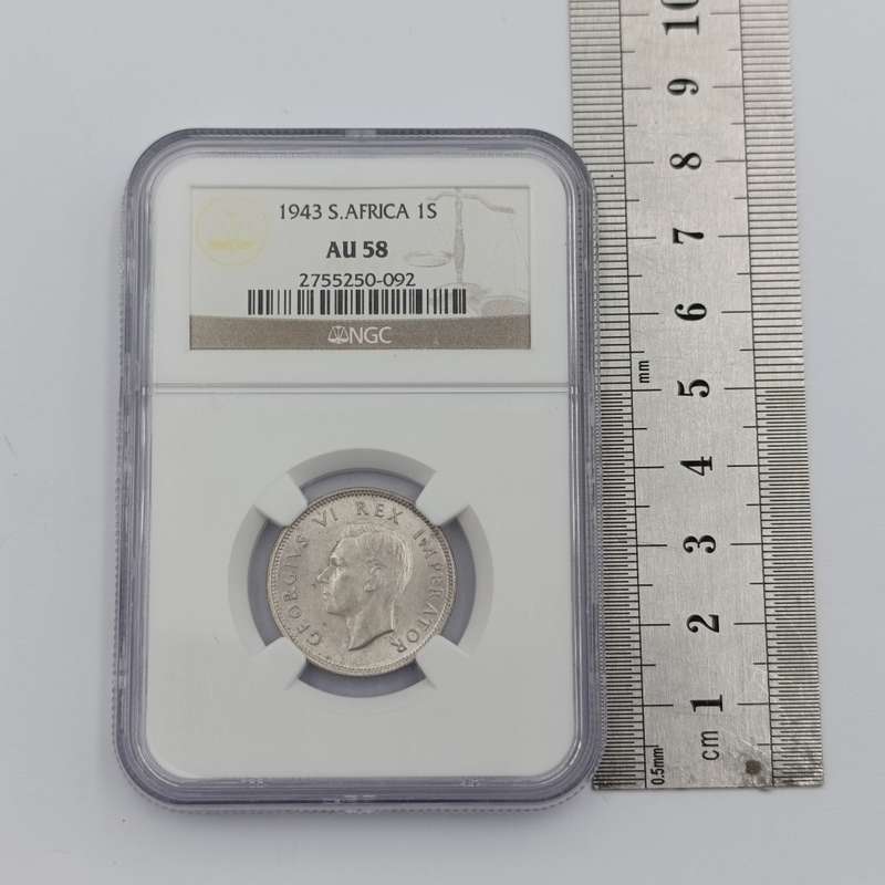 1943 SA Union silver 1 Shilling graded AU 58 by NGC