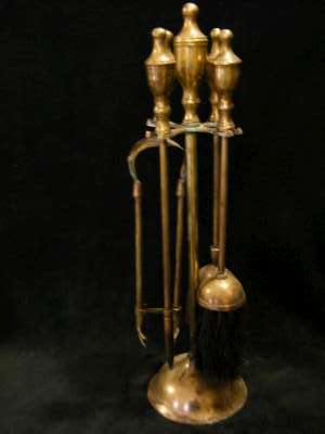 Set of antique brass fire irons