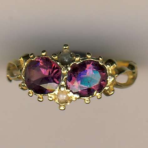 22 ct gold ring with 2 seed pearls & 2 unknown purple stones