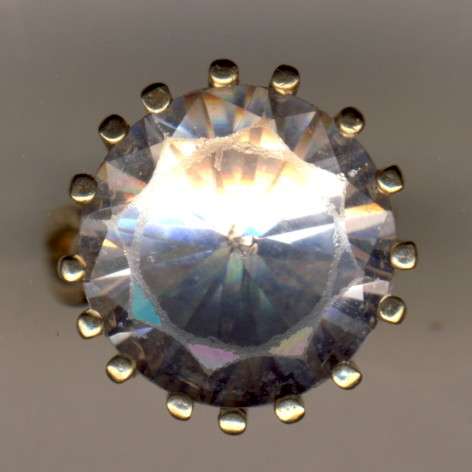 8 gram gold ring with large white sapphire -