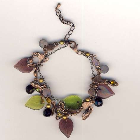 Very nice charm bracelet with leaves and stones as per scan