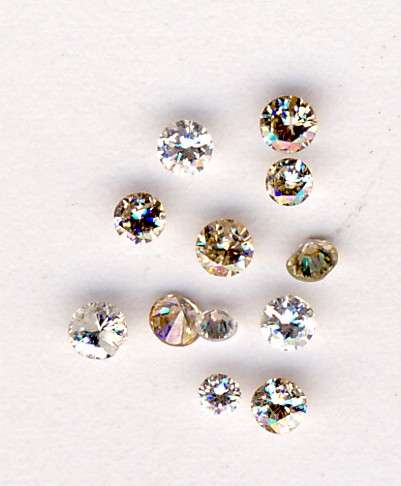 Lot of 12 roughly same size Diamonds with total weight of 0.60 Ct