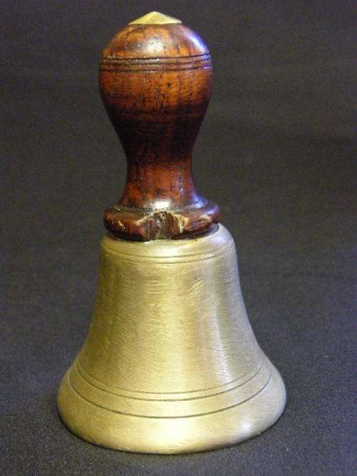 Brass Bell with wooden handle as per photo