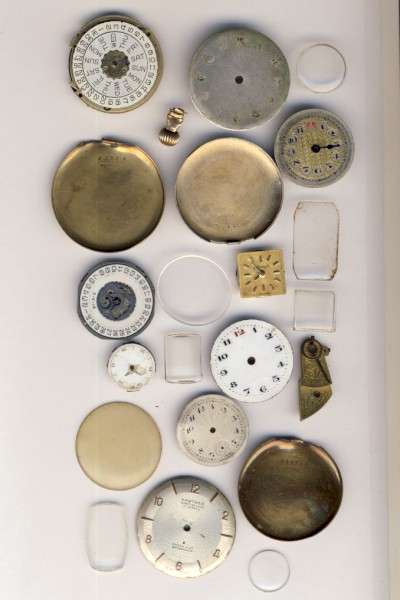 Bag full of watch parts - including Bulova movement - as per scan