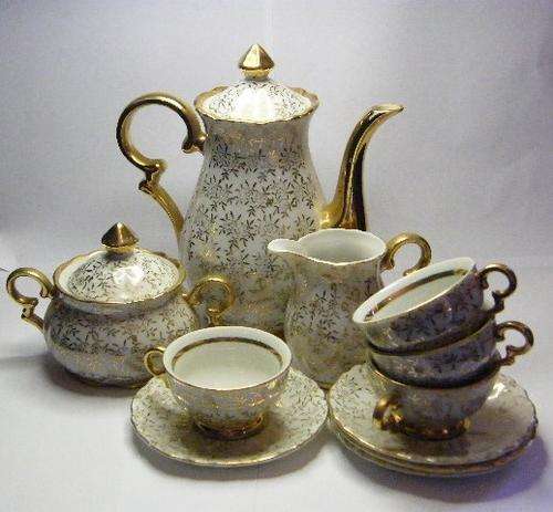 Porcelain Set with 4 cups & saucers, cream jug, sugar pot & tea pot - 13 piece