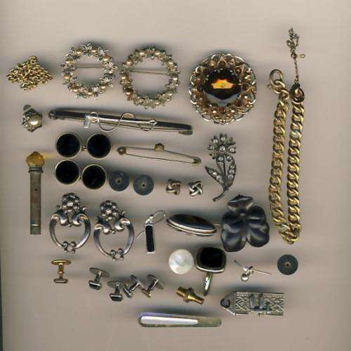 Large lot of costume jewelry as per scan- also antique jewelery case looks like it is made from bone
