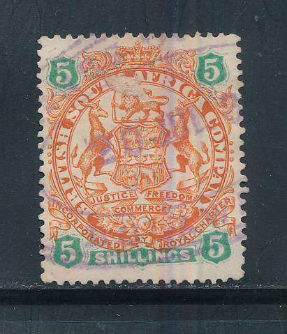 Rhodesia - 1896-97 - Arms Defins - 5s chestnut & emerald fiscally used (SG 49).