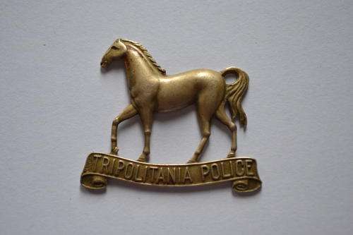 ITALIAN  TRIPOLITANIA POLICE WHITE METAL CAP BADGE