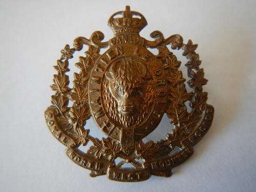 ROYAL NORTH WEST MOUNTED POLICE HAT BADGE