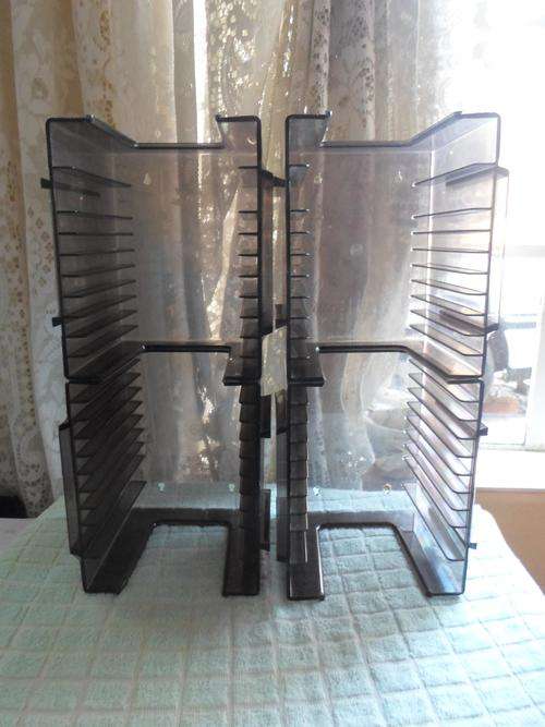 CD holders. 8 Single and 2 Double CD Holders Each.