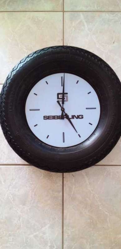 Seiberling Working Tyre Man Cave Wall Clock in a Seiberling Tyre