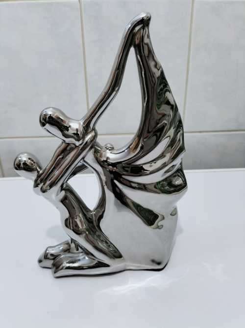 A Magnificent Dancing Couple Glass Statue